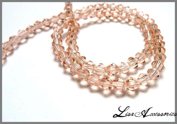 Cristale biconice roz champagne 4 mm