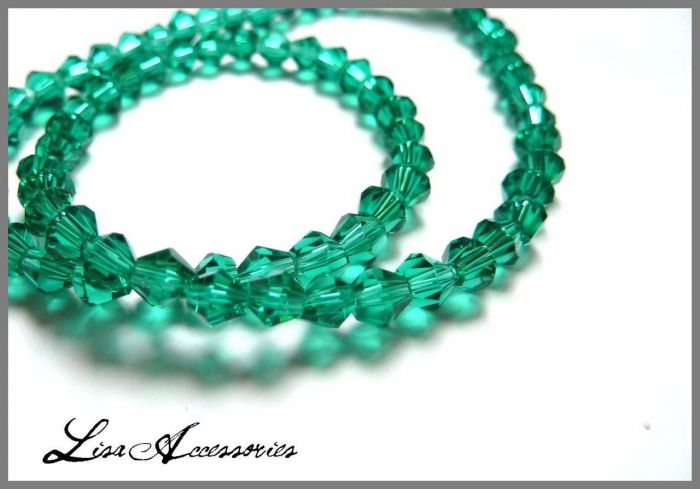 Cristale biconice verde smarald - 4 mm